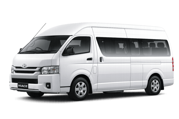 Toyota Hiace Commuter putih tampak serong depan dan samping untuk layanan sewa Hiace Bandung dengan driver profesional