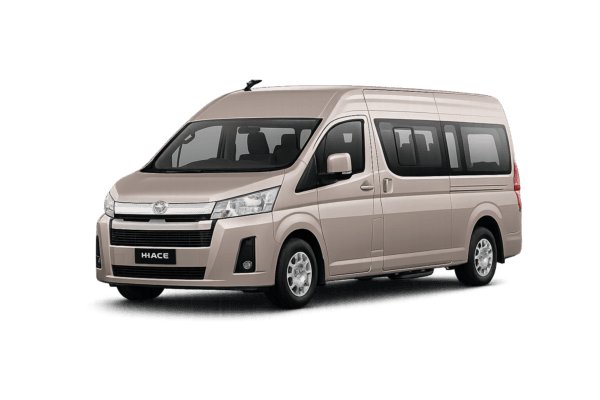 Toyota Hiace Premio coklat muda metallic tampak serong depan dan samping untuk layanan sewa Hiace Bandung dengan driver profesional