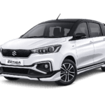 Suzuki All New Ertiga Hybrid putih dari Traveego Bandung Rent Car untuk layanan sewa mobil dengan sopir di Bandung.