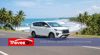 Sewa mobil Bandung ke Pangandaran dengan Toyota Innova putih melintas di jalan pantai